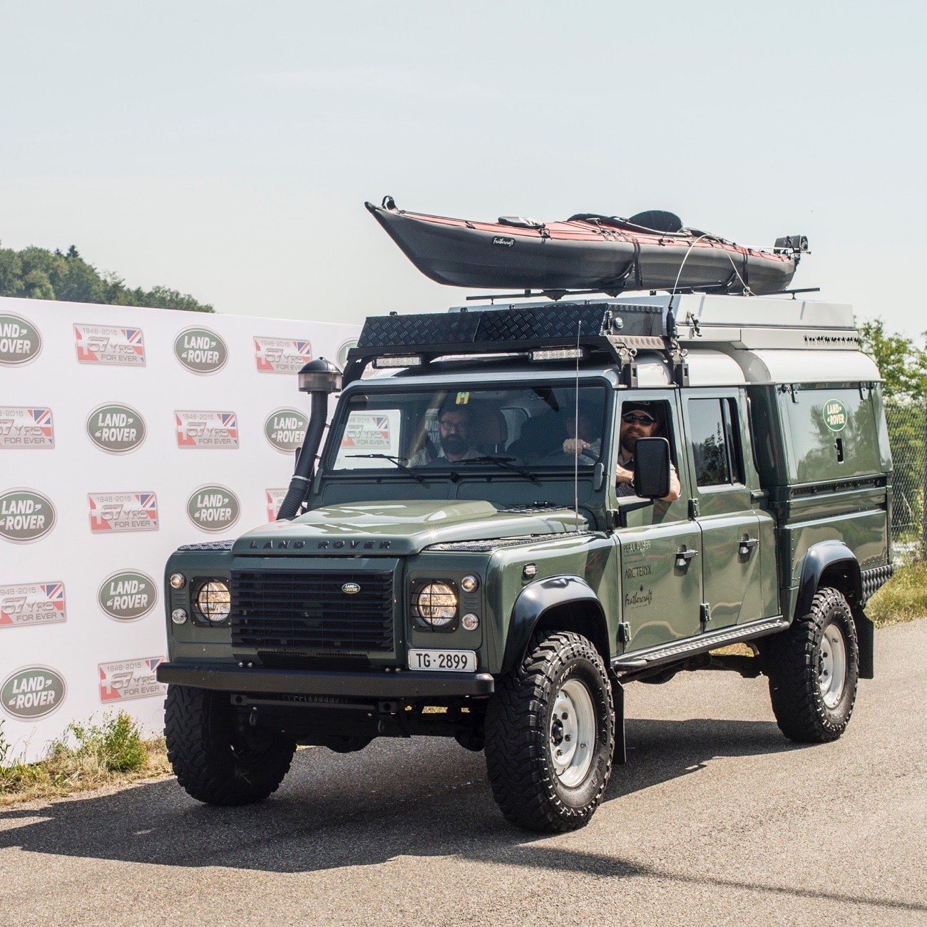 An expedition-equipped Defender 130 crew cab of 2011 — the same model as The Stomach, the team's supply vehicle.