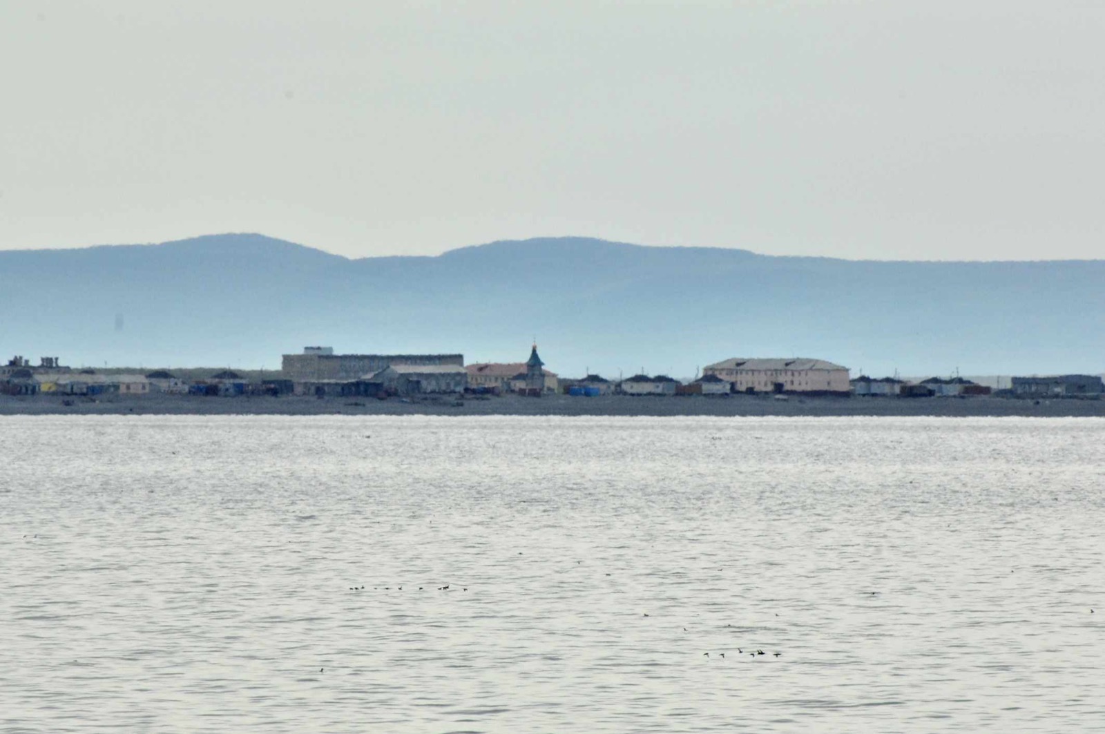 Uelen on its shingle spit between the lagoon and the Chukchi Sea, the easternmost village in Russia, where the winter traverse ended on 2 April 2008 and the Defender drove into the sea on 7 July.