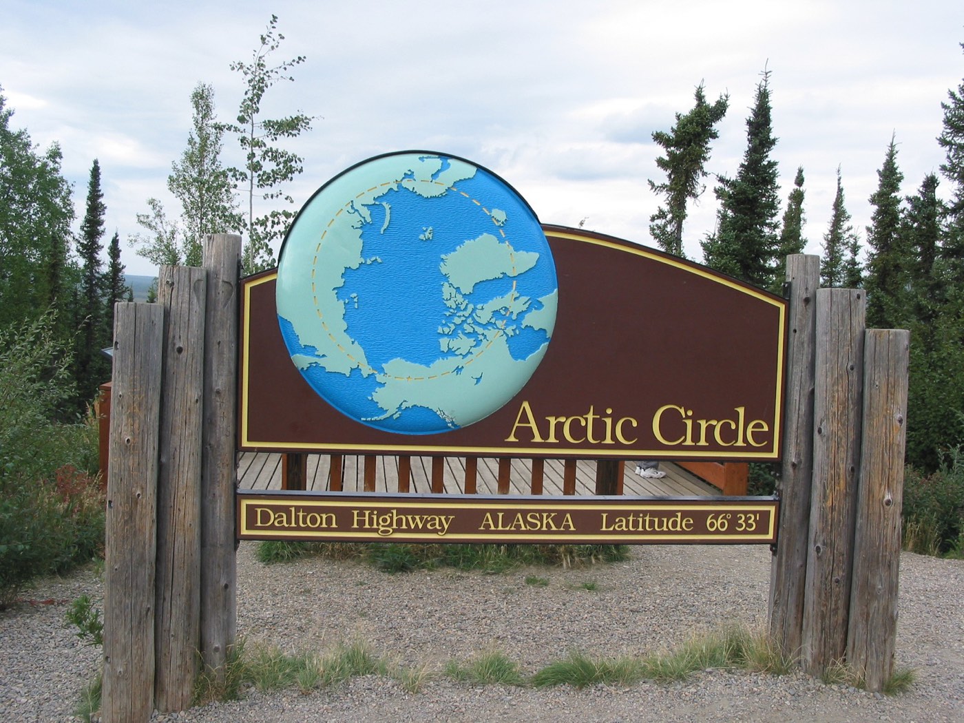 The Arctic Circle sign on the Dalton Highway, where the 2015 convoy stopped for photographs on the way to Coldfoot, Deadhorse and the Beaufort Sea.