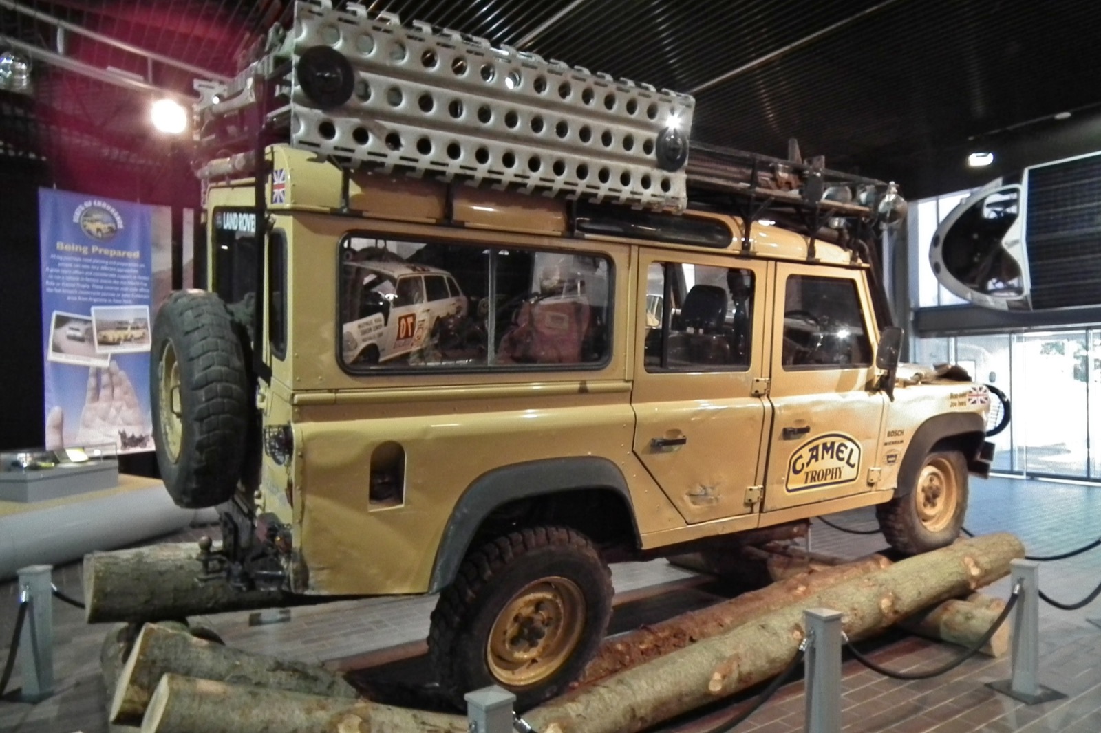The Ives brothers' 1989 Camel Trophy One Ten, still muddy and with their names on the wing, on display at the National Motor Museum, Beaulieu.