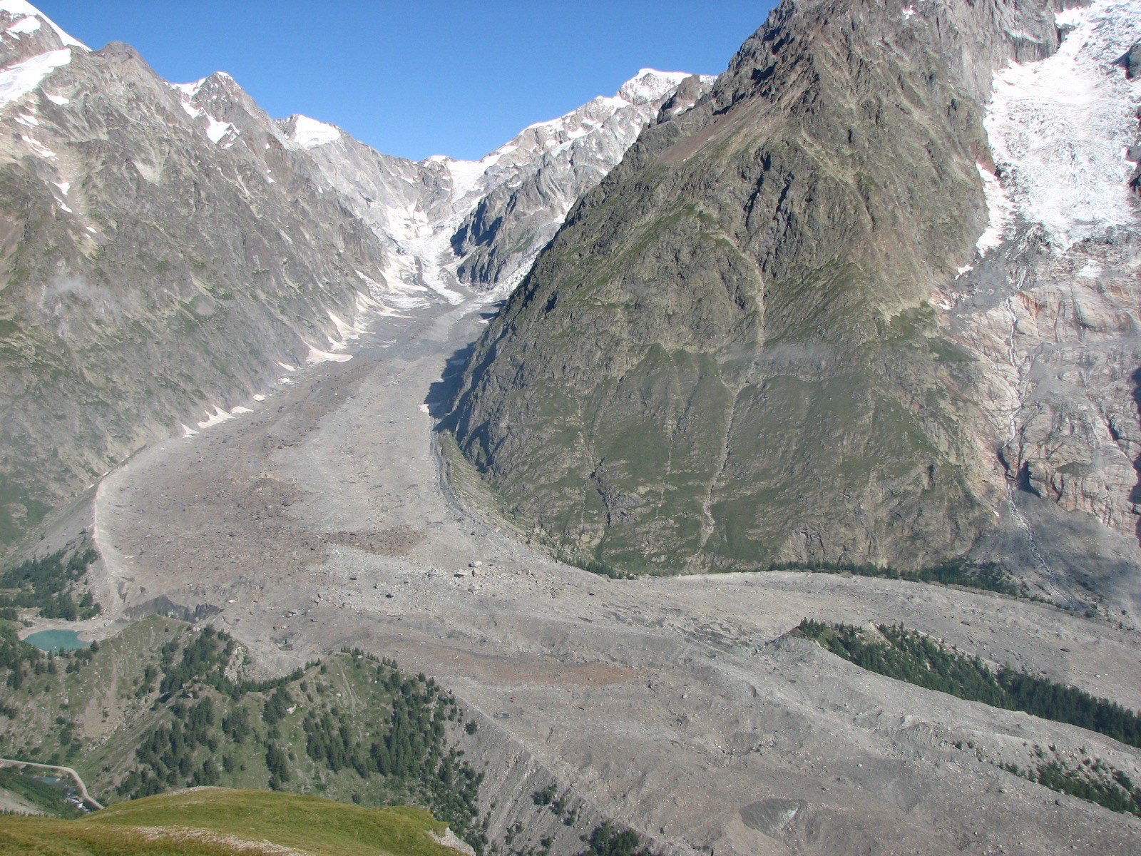 The debris-covered Miage glacier in Val Veny, Aosta Valley, one of the seven study sites and Thomas Shaw's own research glacier. Photographed in 2009.