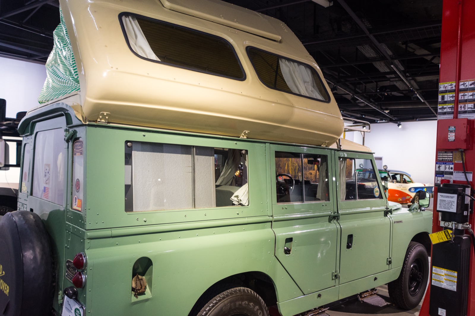 A 1966 Land Rover 109 Series IIA with a Martin Walter Dormobile elevating roof, the type of camping conversion fitted to two of the expedition's three long-wheelbase Land Rovers (museum example, not an expedition car).