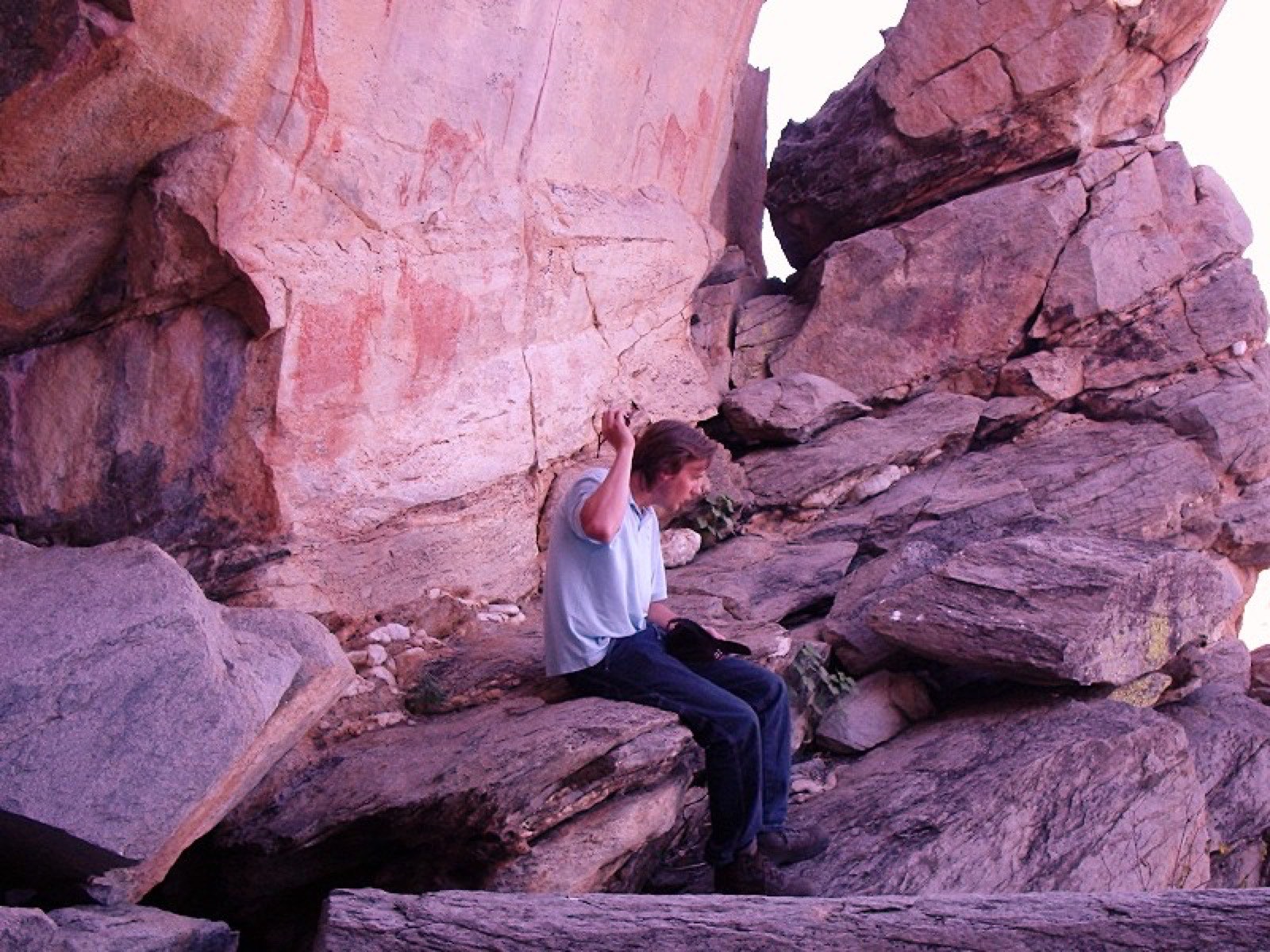 The Laurens van der Post panel of rock paintings at the Tsodilo Hills, photographed in 2006 — named for the writer who described it in The Lost World of the Kalahari.