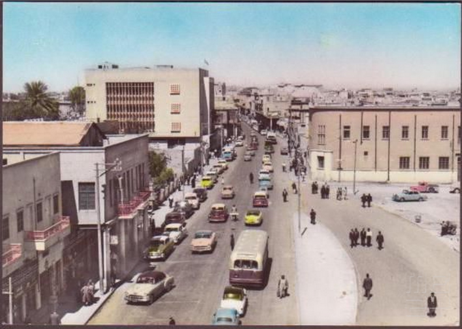 Al Rasheed Street, Baghdad, on a 1950s postcard: the city Toy had bet she would reach.