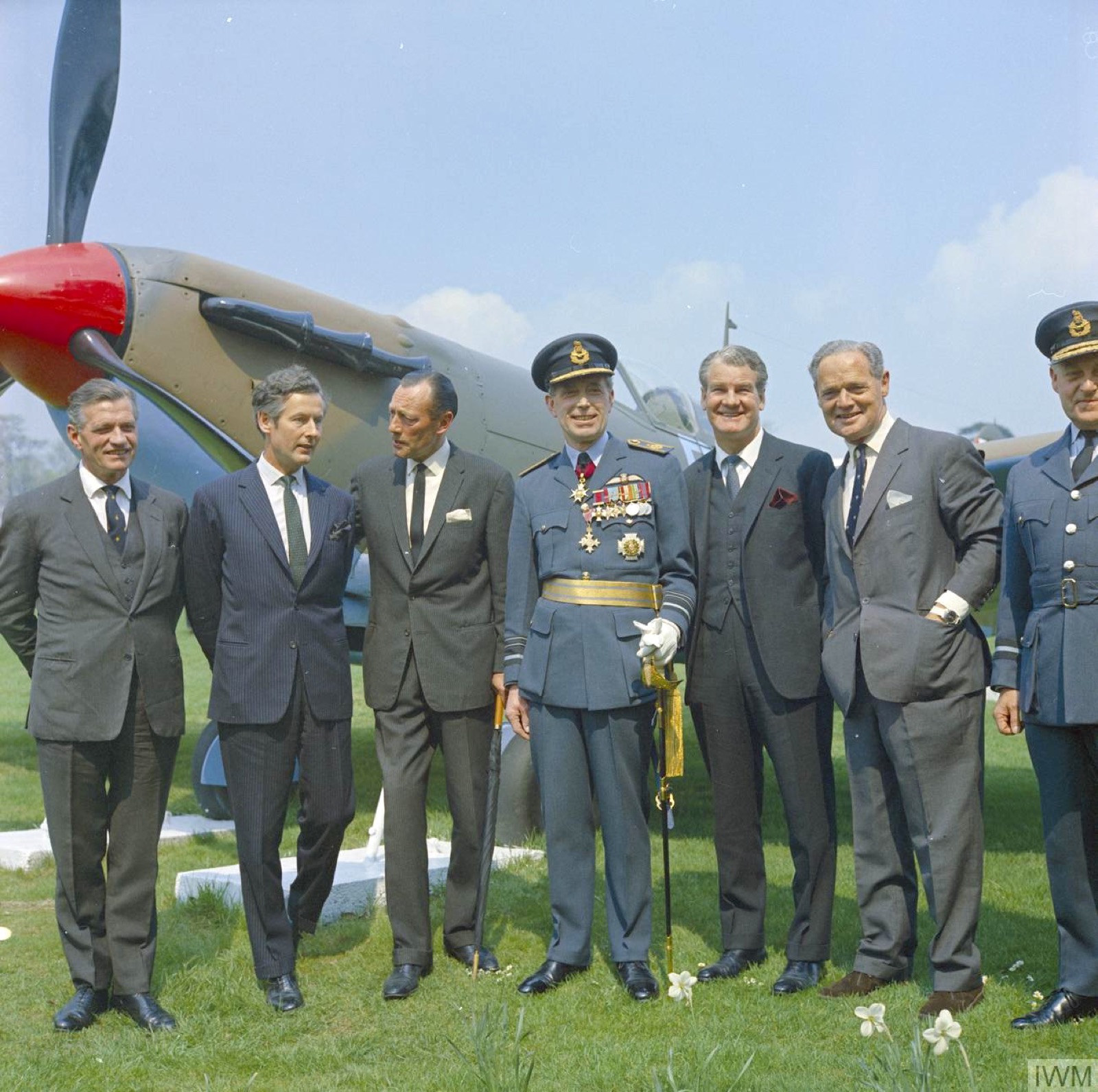 Peter Townsend (second from left) with fellow Battle of Britain pilots in front of a Hurricane in 1968, ten years after his drive round the world.