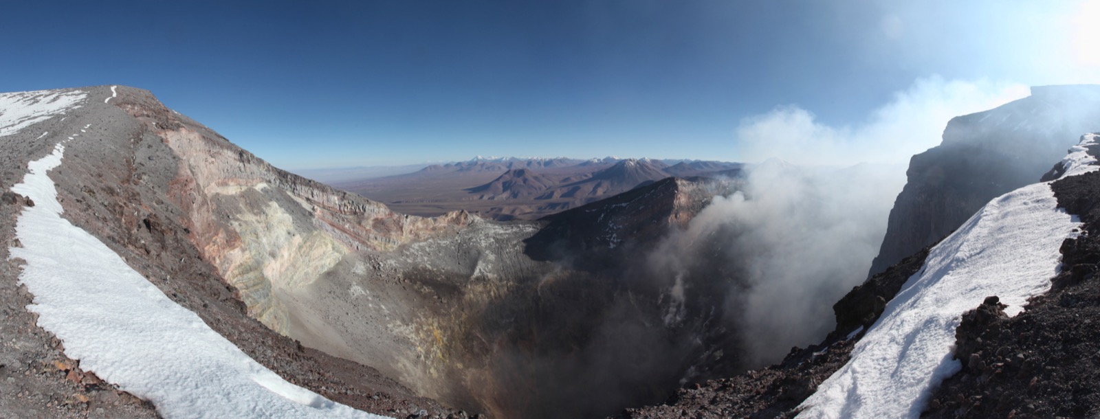 The steaming summit crater of Lascar in northern Chile, climbed four times by the team in January 2016 to collect gas samples.