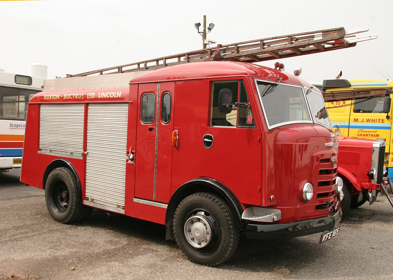 Not a Land Rover: a 1956 Karrier Gamecock with Carmichael fire-engine body, new to Ruston Bucyrus of Lincoln, at the Lincoln Transport Museum in 2014 — typical of the firm's wider fire-appliance trade.